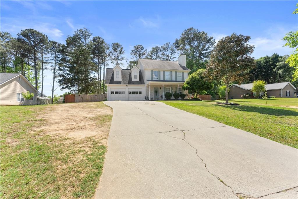 709 Muirfield Drive Winder, GA 30680 - Photo 10 of 65 a view of a house with a yard