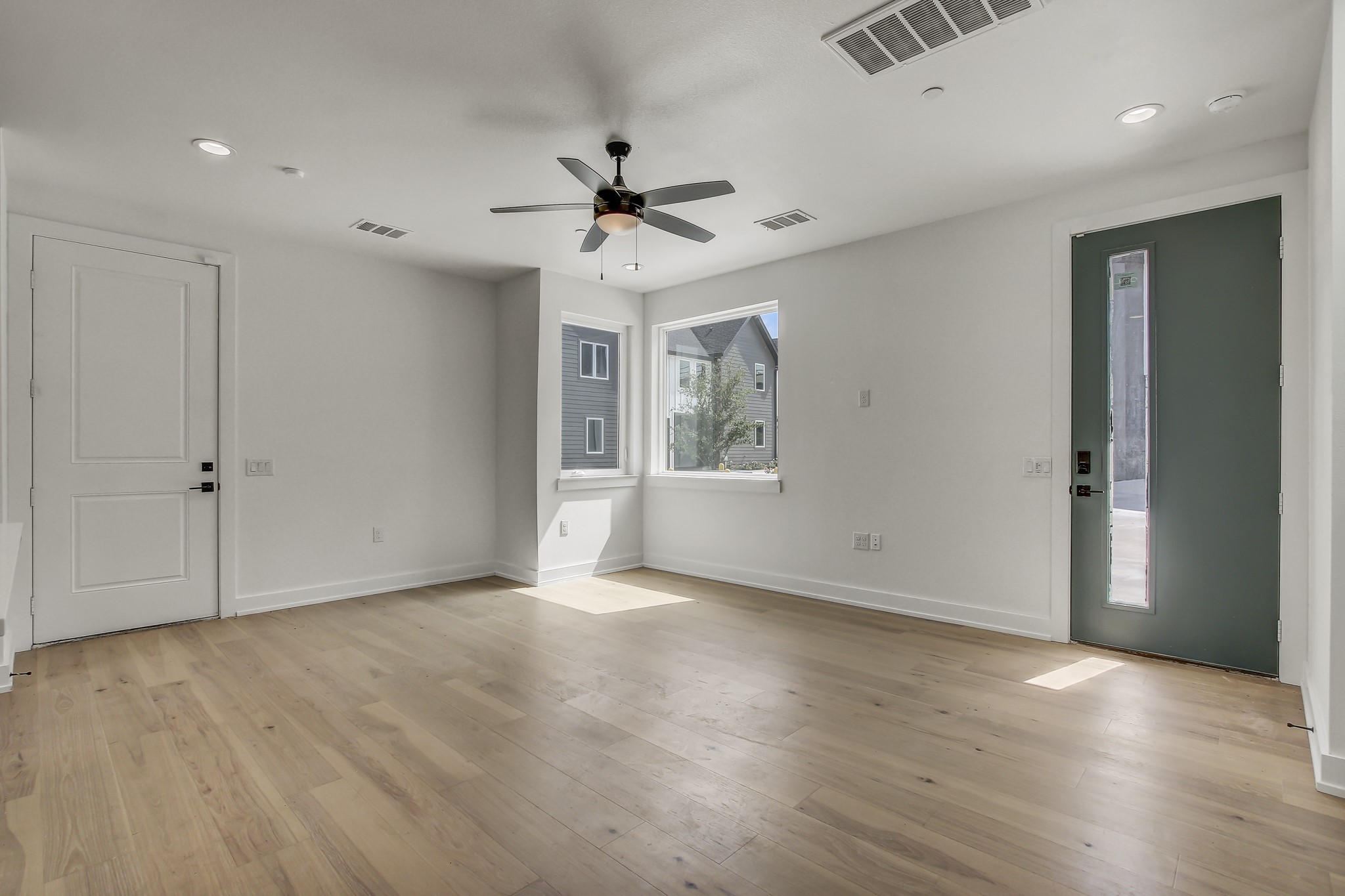 4127 East 12th Street, Unit 1 Austin, TX 78721 - Photo 8 of 30 a view of an empty room with a window
