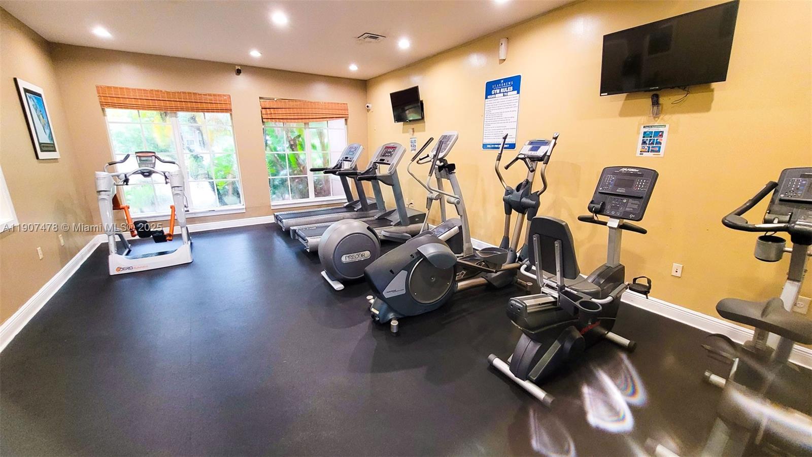 12124 St Andrews Place, Unit 203 Miramar, FL 33025 - Photo 27 of 29 a view of a room with gym equipment