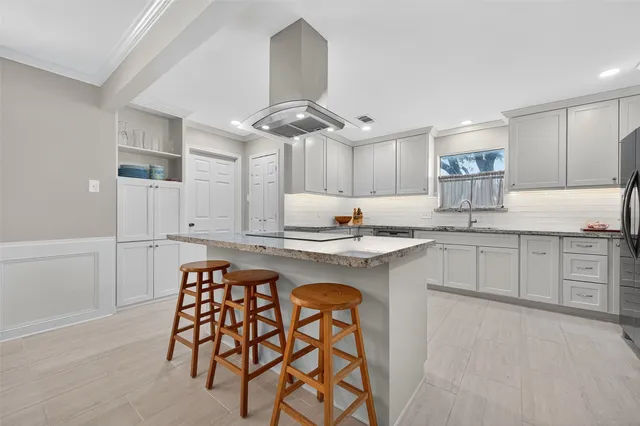 a large kitchen with cabinets