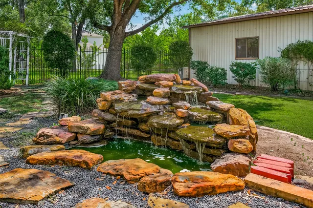 a outdoor space with patio the couches and a dining table with garden view