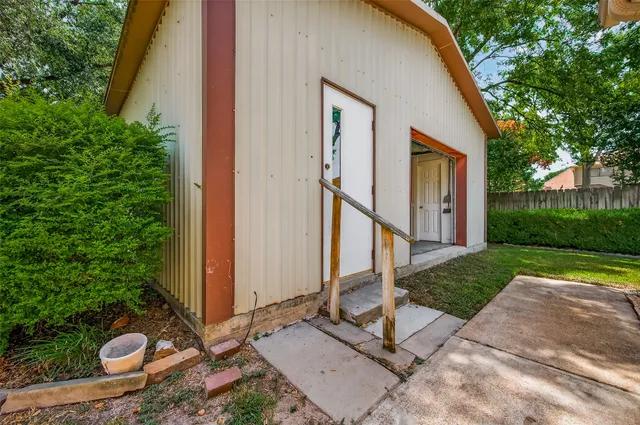 a view of a house with garden