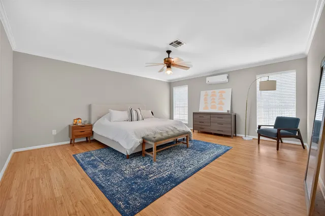 a view of entryway and hall with a front door