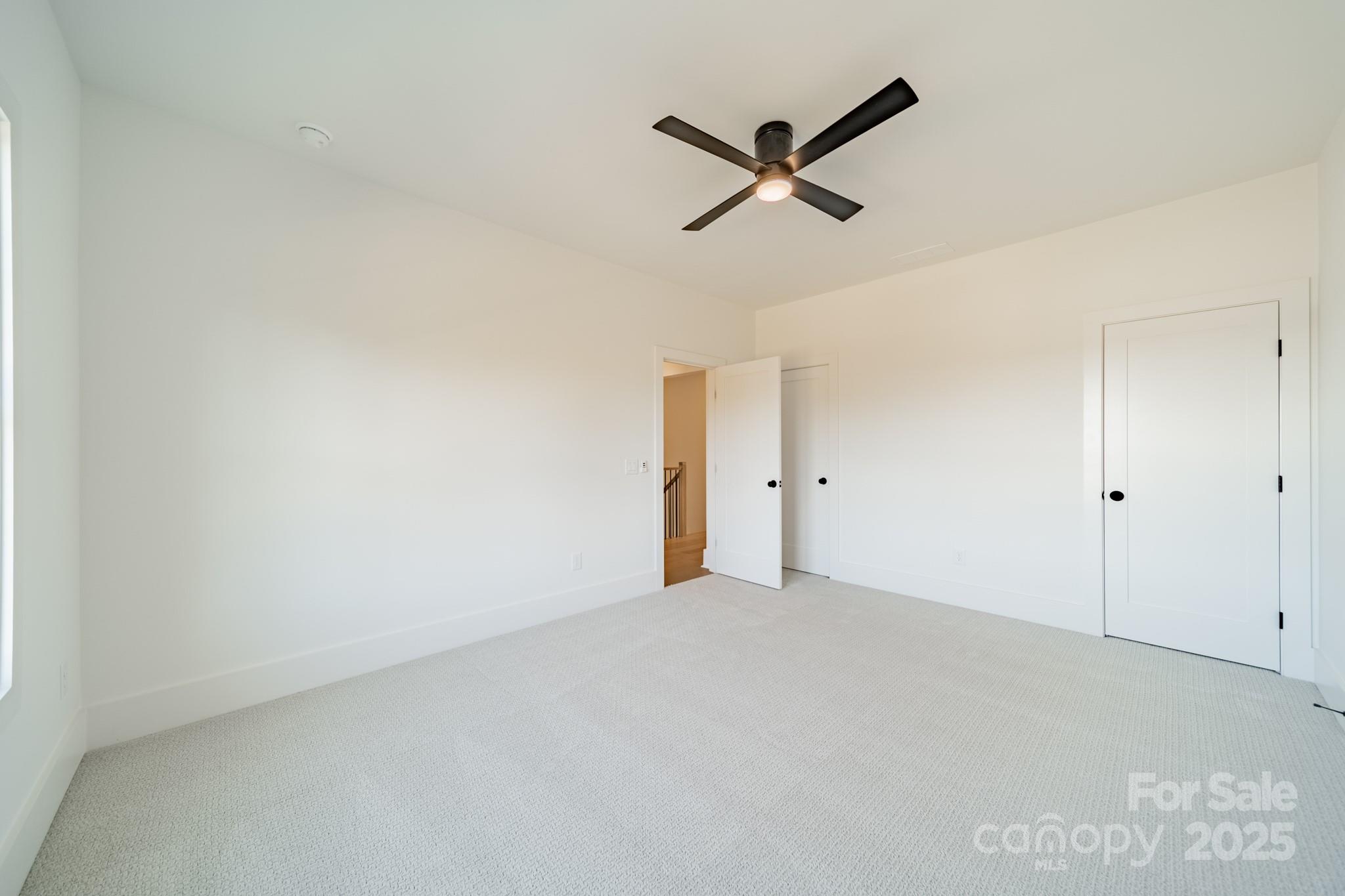 19032 Newburg Hill Road, Unit 23 Davidson, NC 28036 - Photo 36 of 39 wooden floor in an empty room