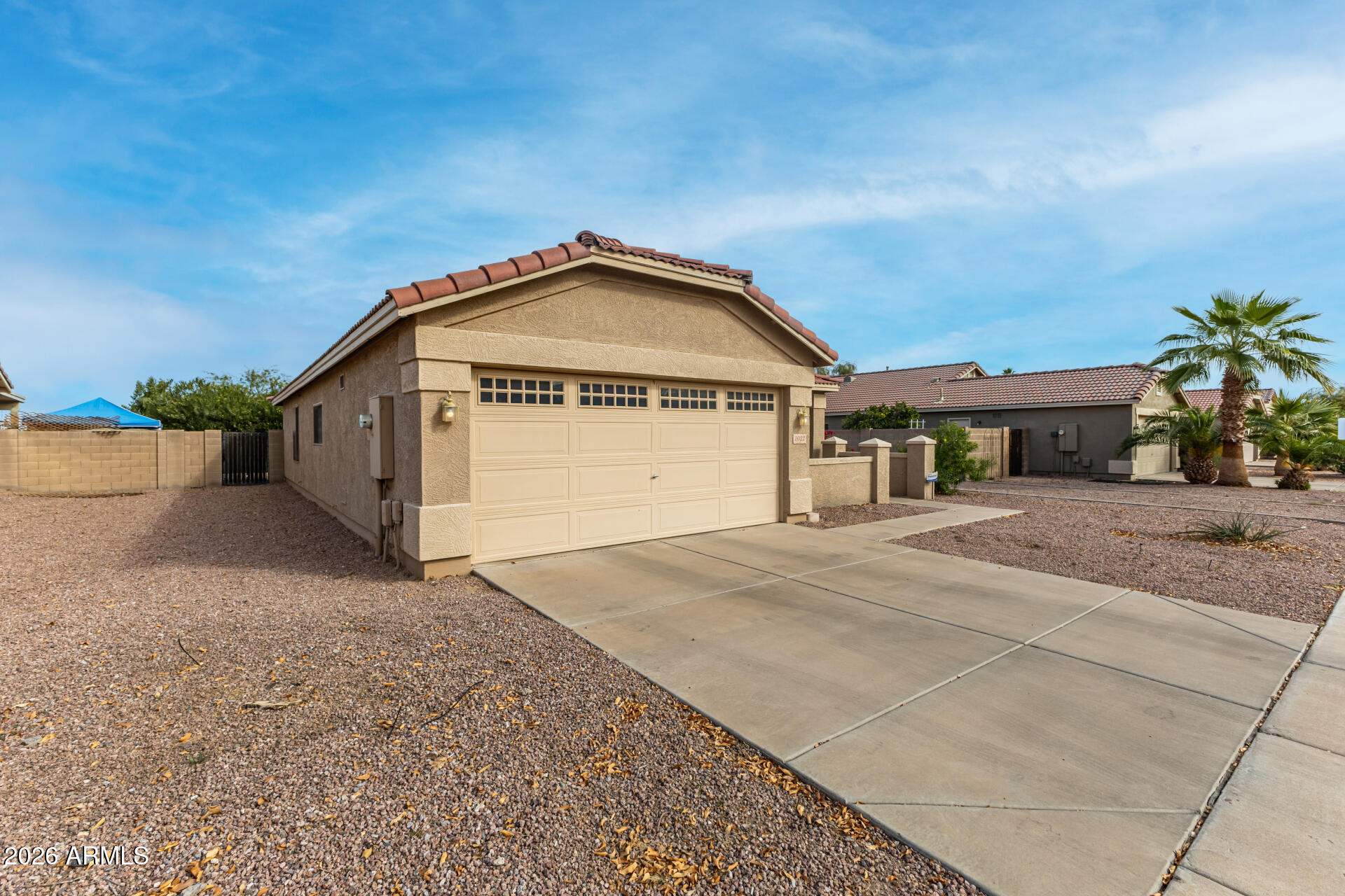 1022 East Pedro Road Phoenix, AZ 85042 - Photo 2 of 29 a view of garage and yard