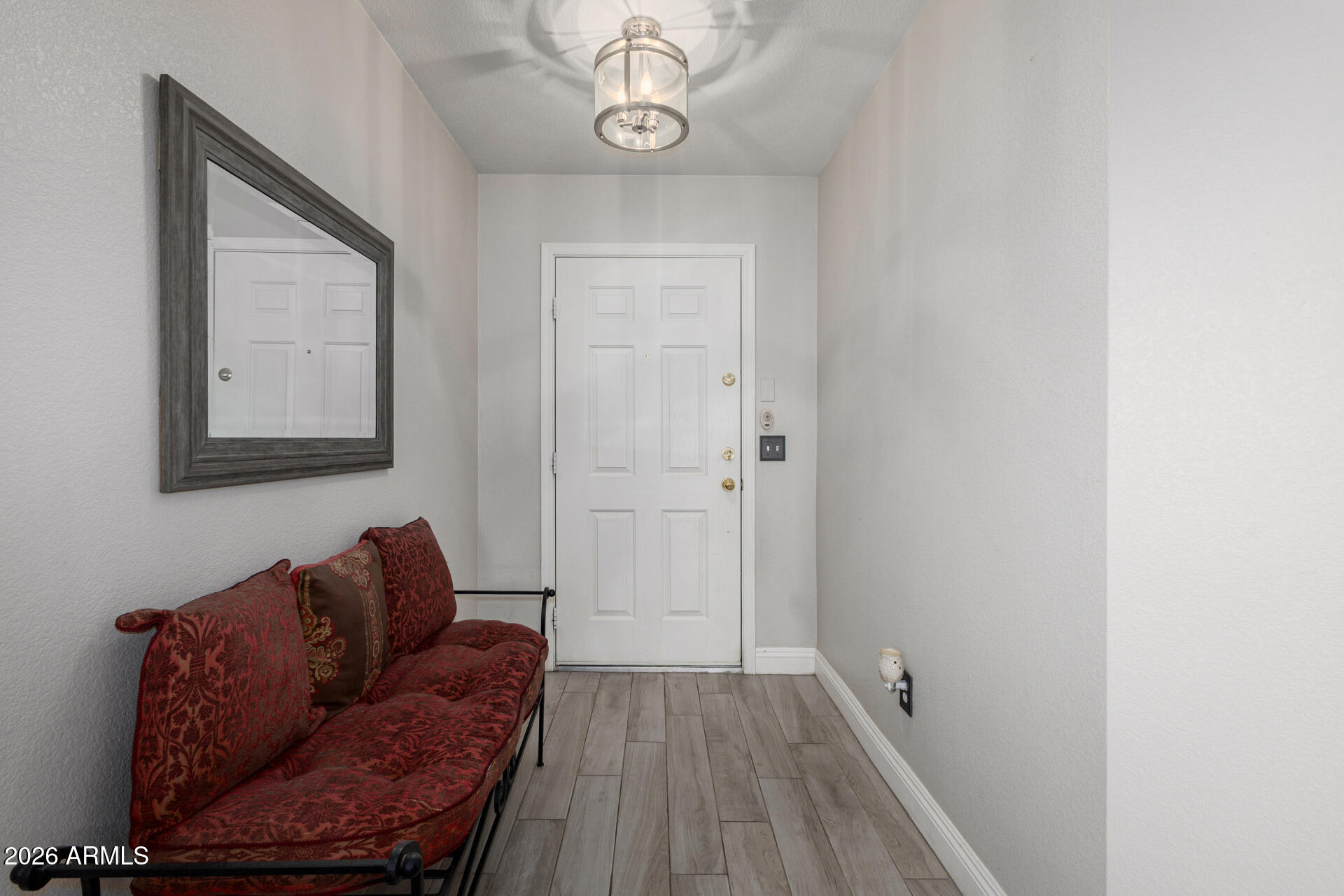 1022 East Pedro Road Phoenix, AZ 85042 - Photo 6 of 29 a living room with furniture and a wooden floor