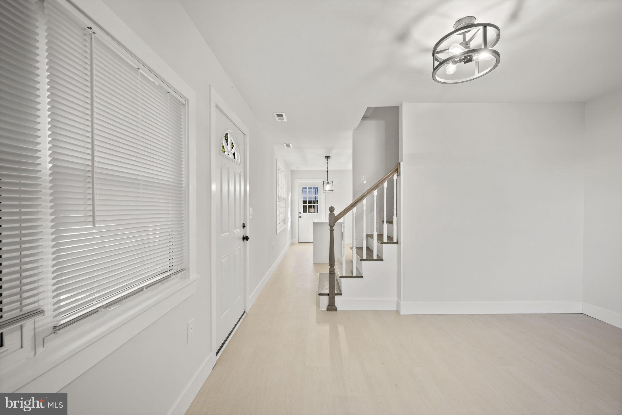 821 South Woodlynn Road Baltimore, MD 21221 - Photo 2 of 32 a view of an entryway with wooden floor