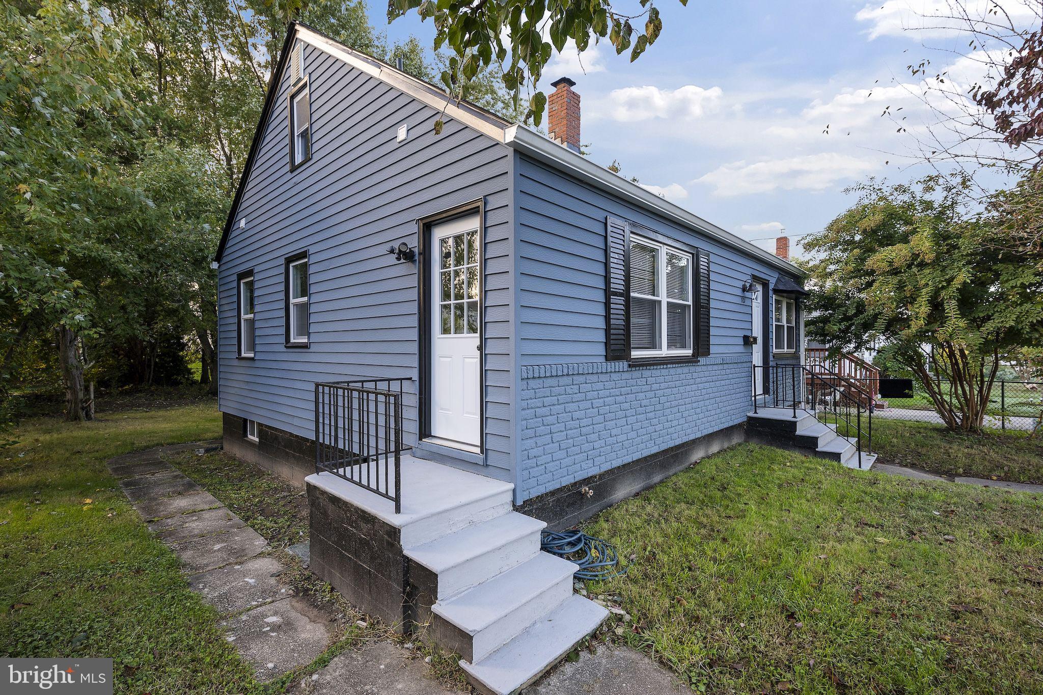 821 South Woodlynn Road Baltimore, MD 21221 - Photo 32 of 32 a view of a house with a yard