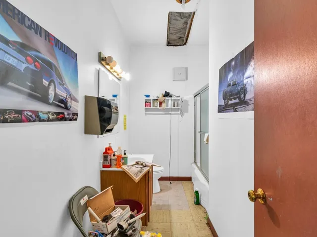 a room with furniture and a flat screen tv