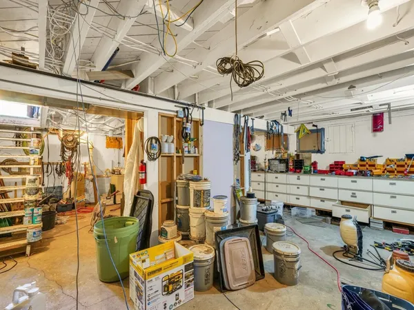 a view of gym equipment with furniture