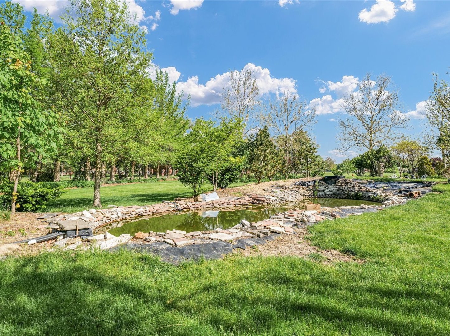 810 South Century Boulevard Rantoul, IL 61866 - Photo 20 of 32 a view of a garden with a fountain