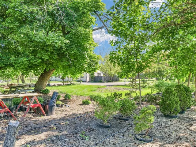 a view of outdoor space with deck and garden