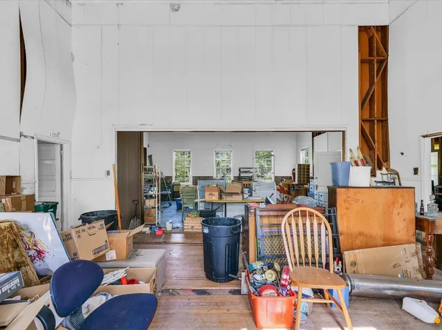 a outdoor living space with furniture and a fireplace