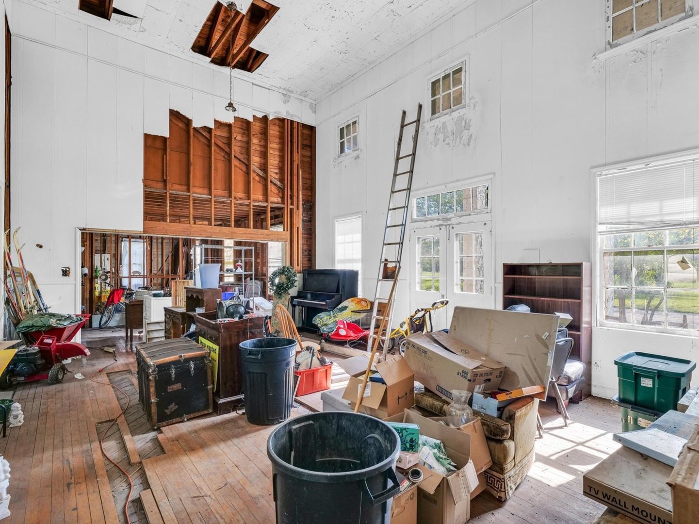 810 South Century Boulevard Rantoul, IL 61866 - Photo 6 of 32 a living room with furniture a fireplace and a large window