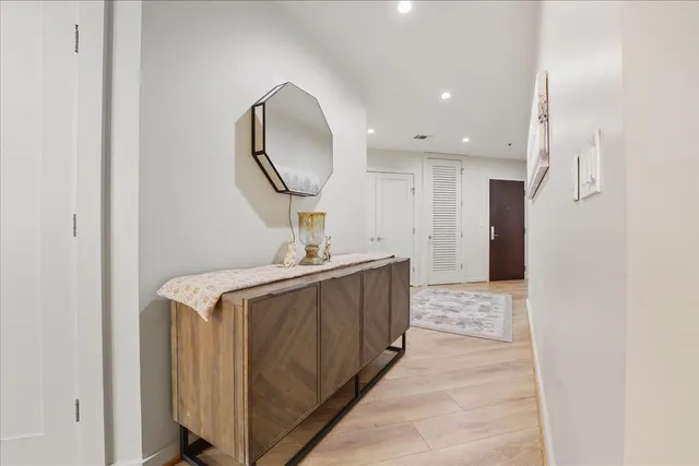 a kitchen with stainless steel appliances a refrigerator and a sink