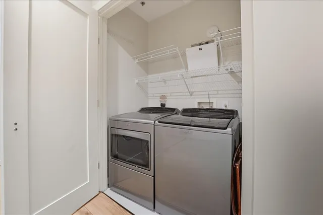 a utility room with dryer and washer