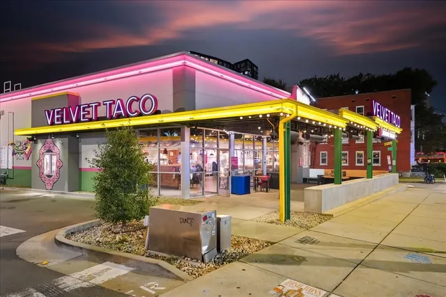 a cafe on the corner of the street
