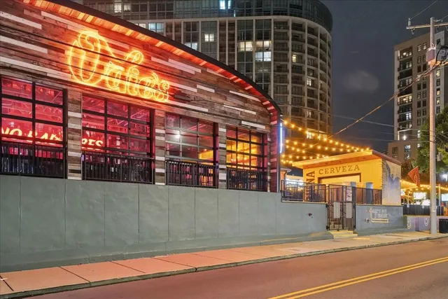 a view of a building with a street