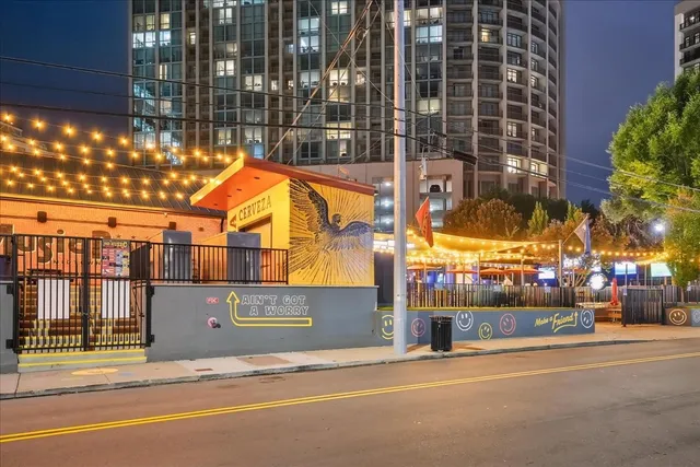 a view of a building with a street