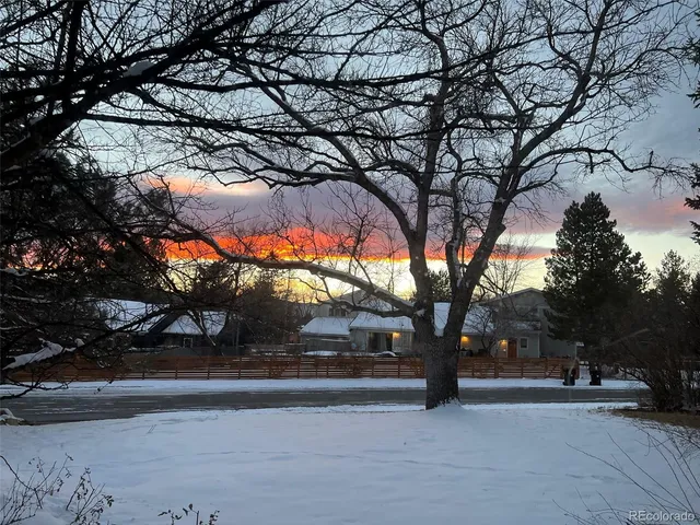 a picture of a kitchen with a refrigerator
