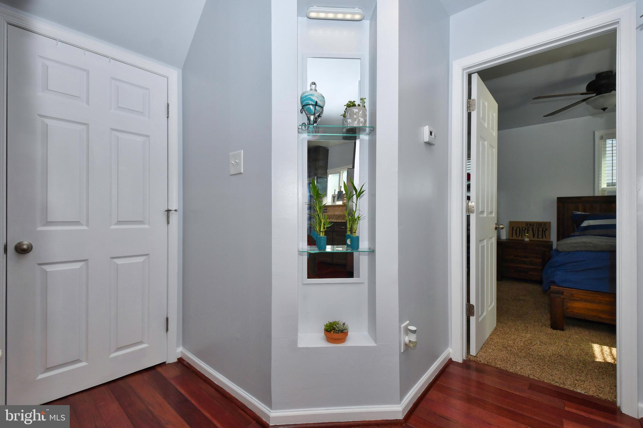 831 Martin Road Baltimore, MD 21221 - Photo 8 of 28 First Floor: Full Bath, Primary Suite, & Storage