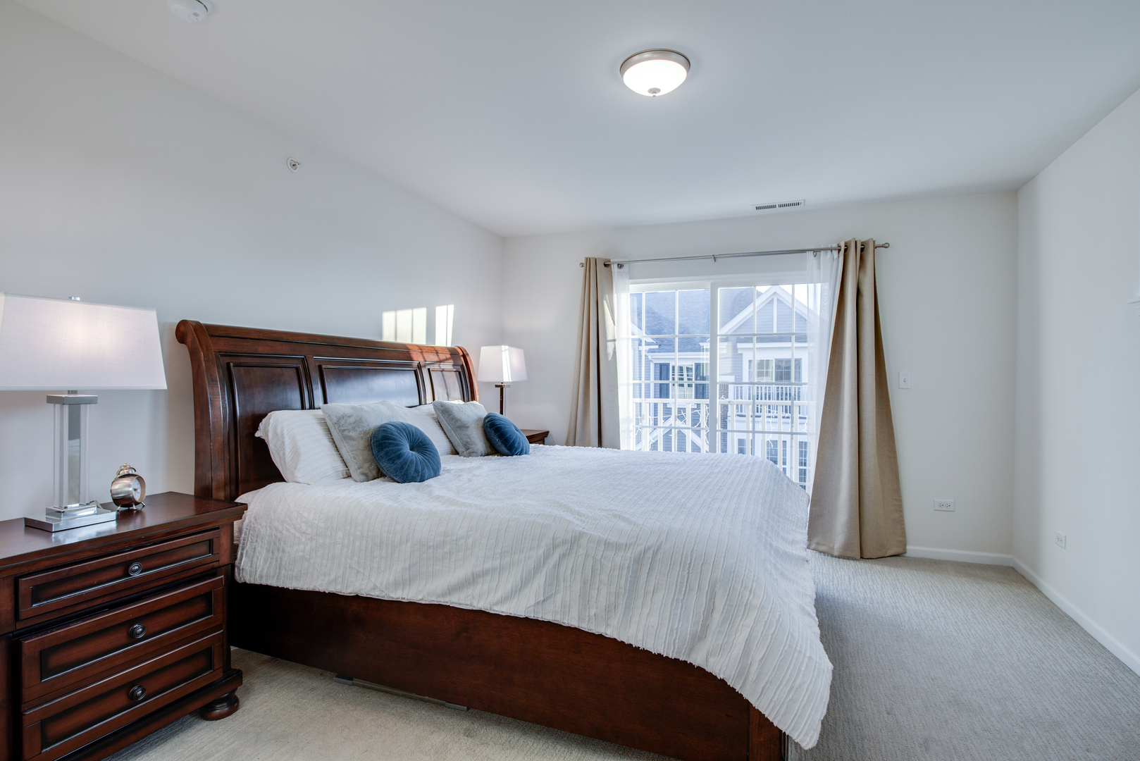 4477 Monroe Court Naperville, IL 60564 - Photo 12 of 23 a bedroom with a bed and a window