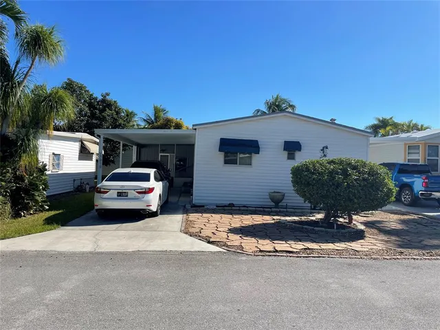 a house view with a garden space