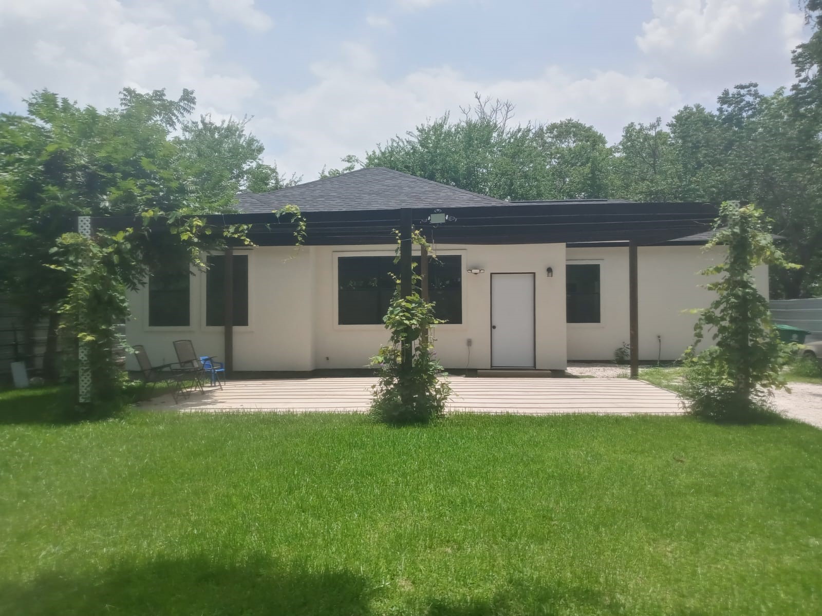 7828 Pardee Street Houston, TX 77028 - Photo 1 of 18 a view of a house with a yard and tree s