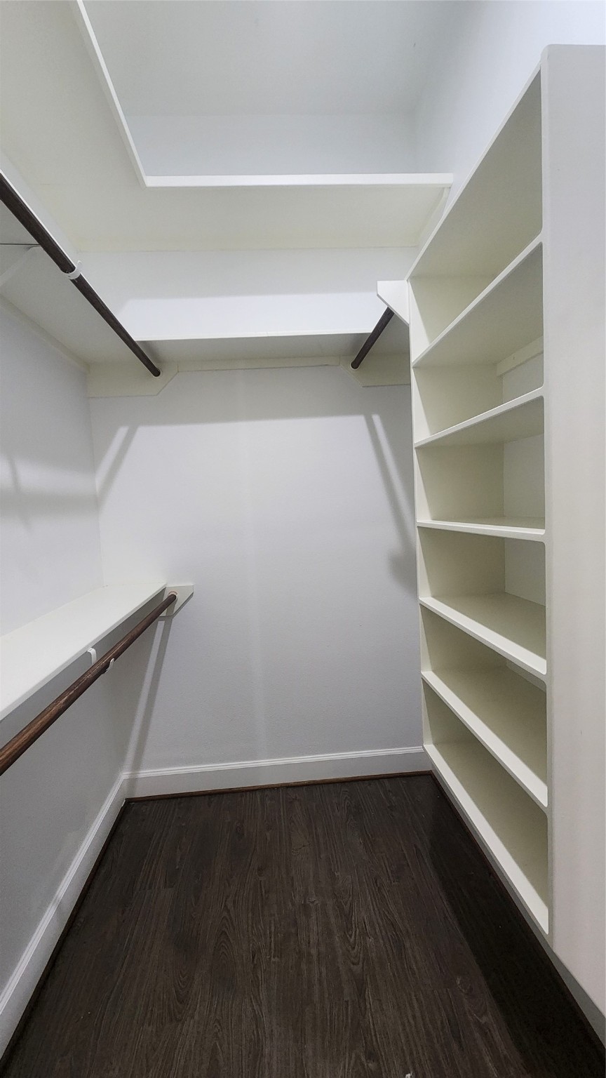7828 Pardee Street Houston, TX 77028 - Photo 13 of 18 a view of an empty walk in closet