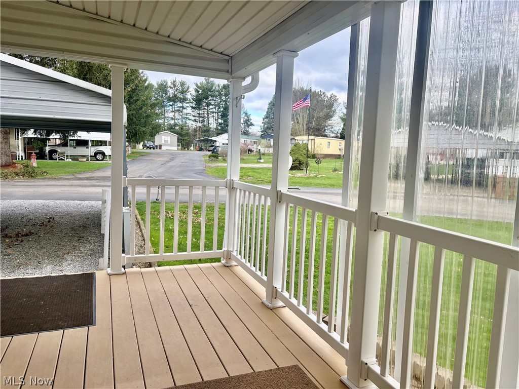 5852 Cleveland Road, Unit 22 Wooster, OH 44691 - Photo 8 of 35 Covered Front/Side porch.
