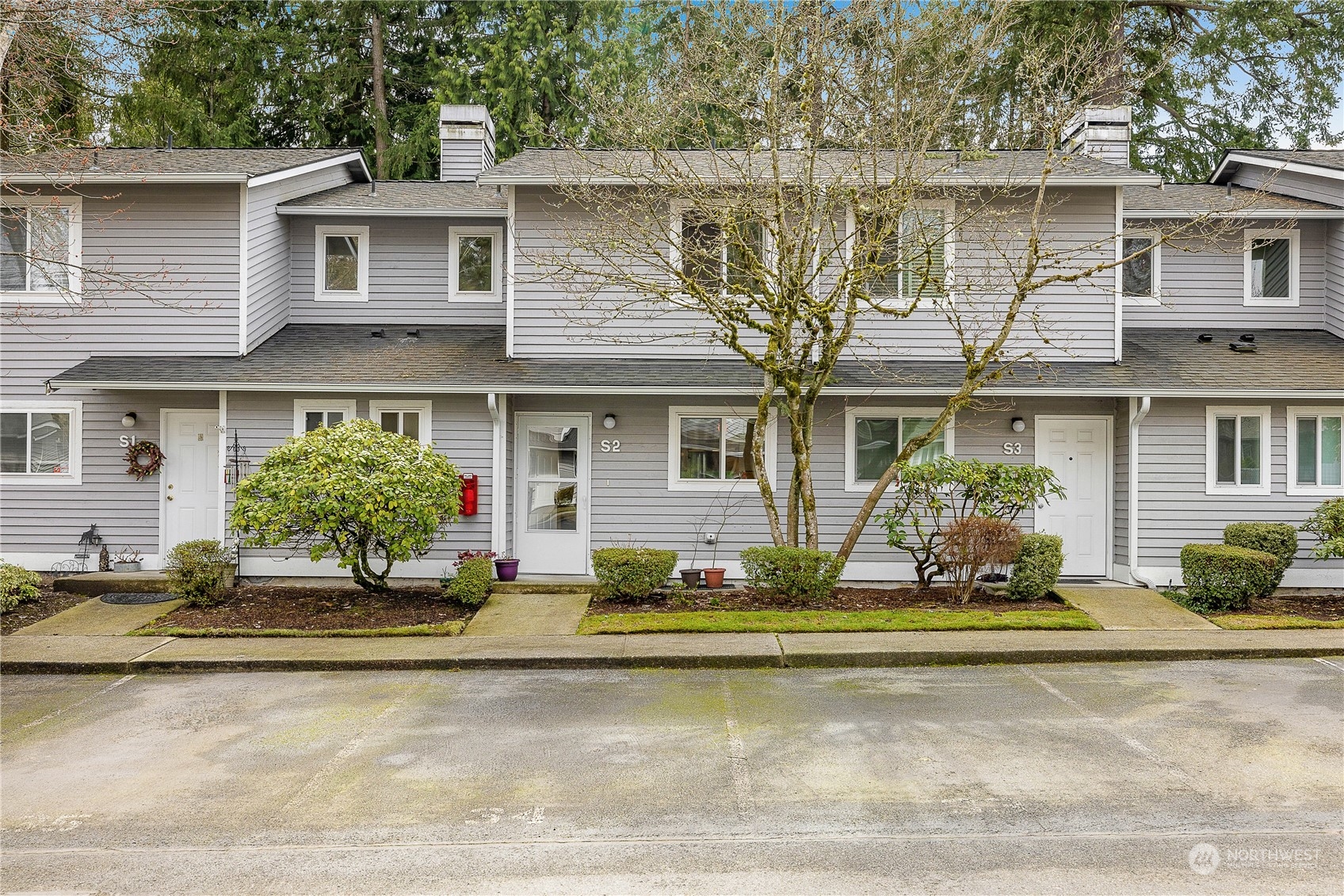 1526 192nd Street Southeast, Unit S2 Bothell, WA 98012 - Photo 1 of 16 front view of a house with a yard