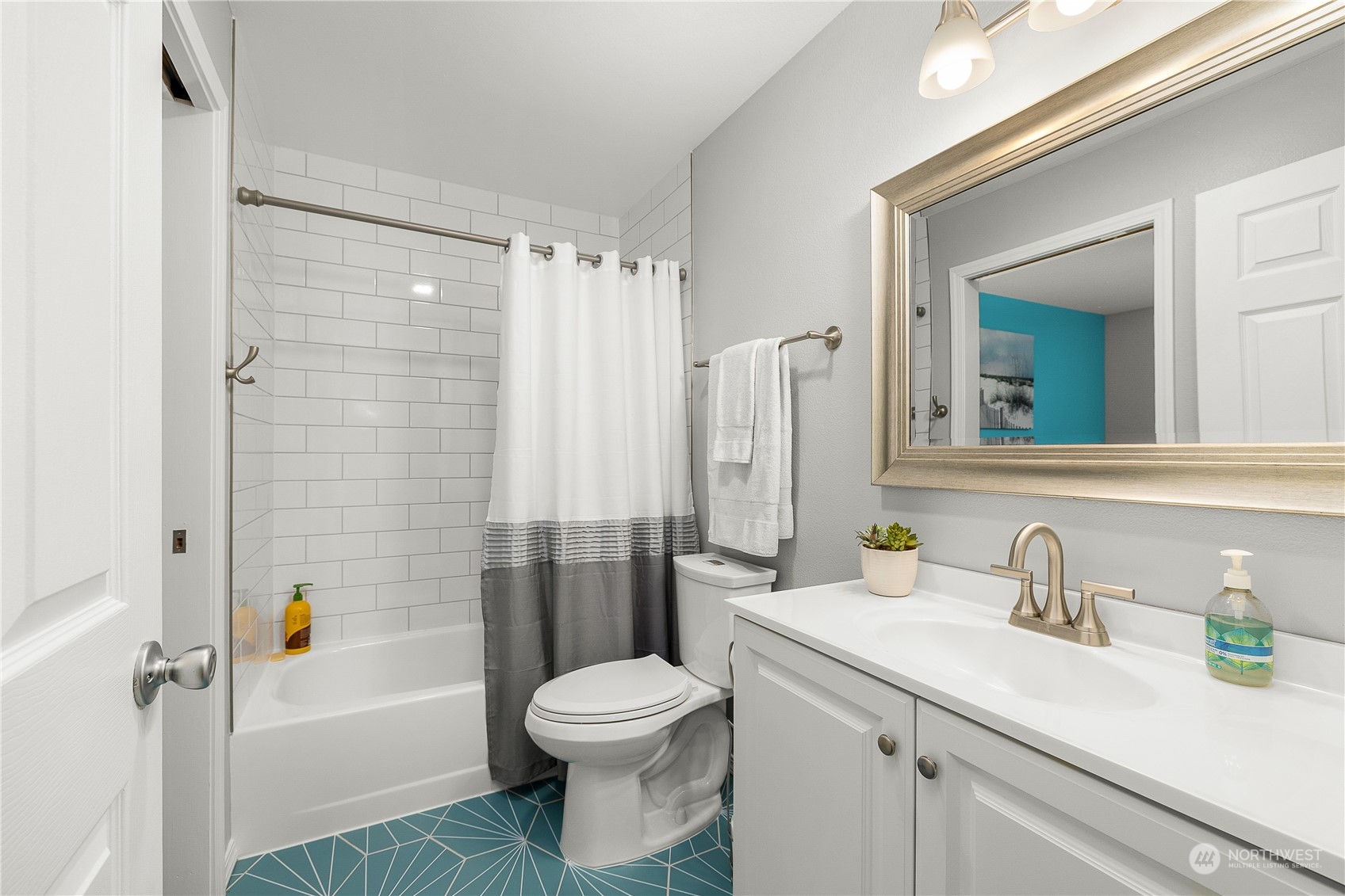 1526 192nd Street Southeast, Unit S2 Bothell, WA 98012 - Photo 11 of 16 a bathroom with a sink a toilet and shower