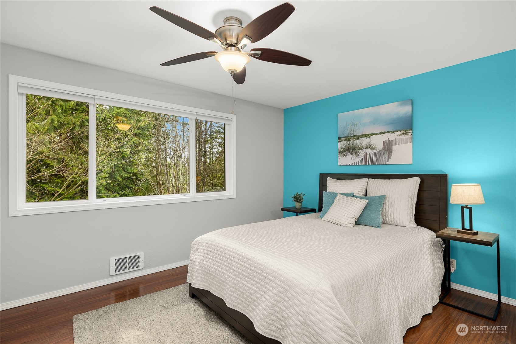 1526 192nd Street Southeast, Unit S2 Bothell, WA 98012 - Photo 12 of 16 a bedroom with a large bed and a window