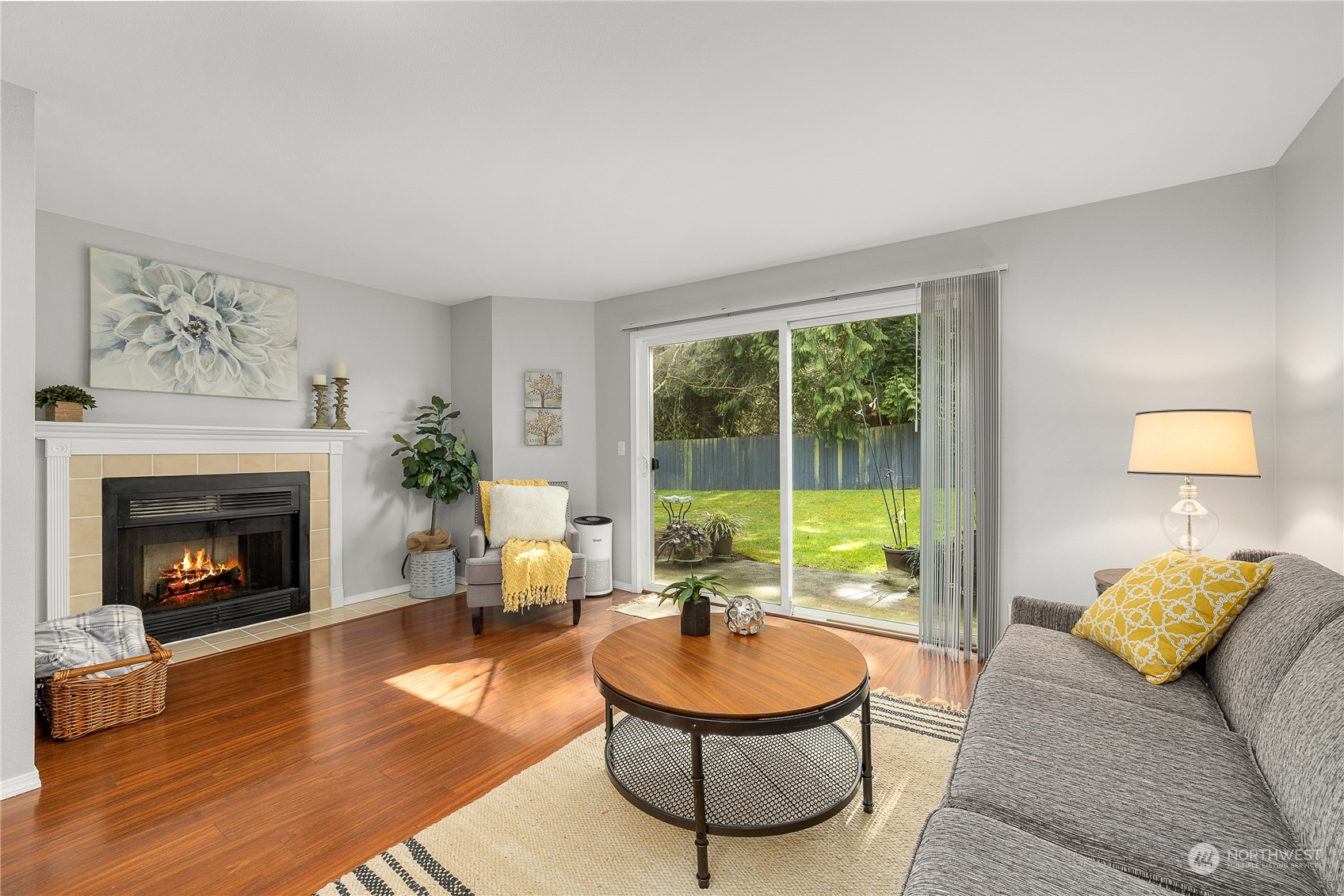 1526 192nd Street Southeast, Unit S2 Bothell, WA 98012 - Photo 9 of 16 a living room with furniture and a fireplace