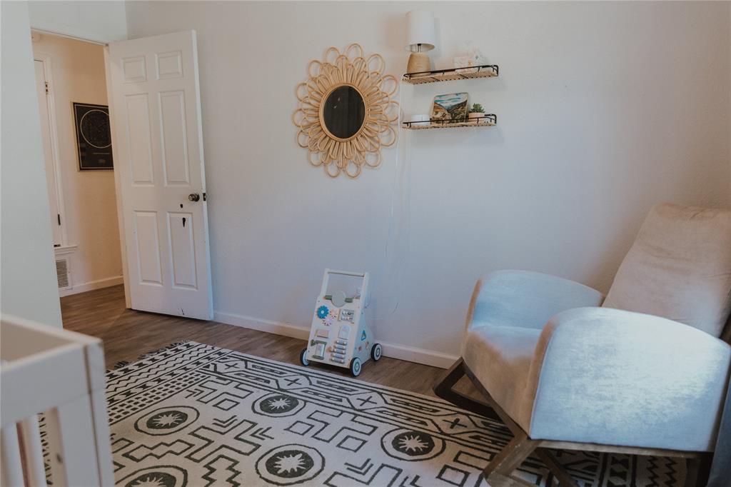 312 Perkins Road Krugerville, TX 76227 - Photo 21 of 32 a bathroom with a toilet and a mirror