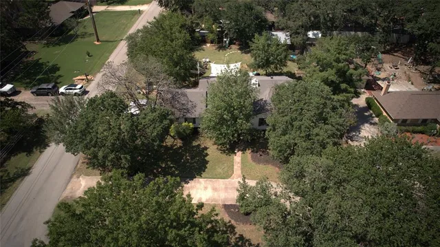an aerial view of residential house with outdoor space