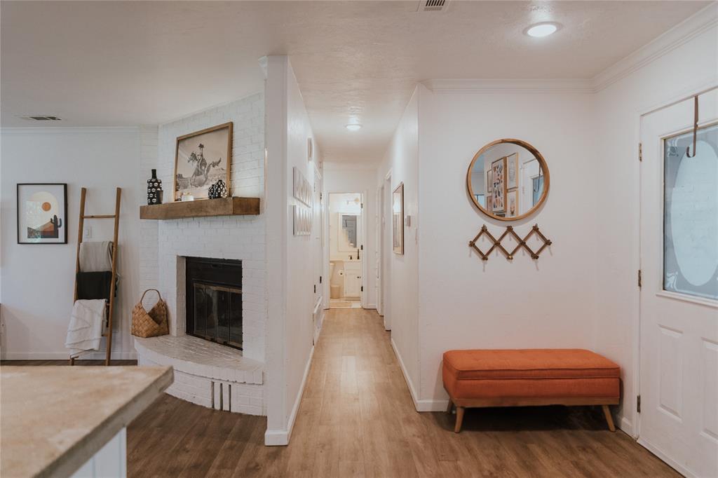 312 Perkins Road Krugerville, TX 76227 - Photo 7 of 32 a living room with furniture and a fireplace