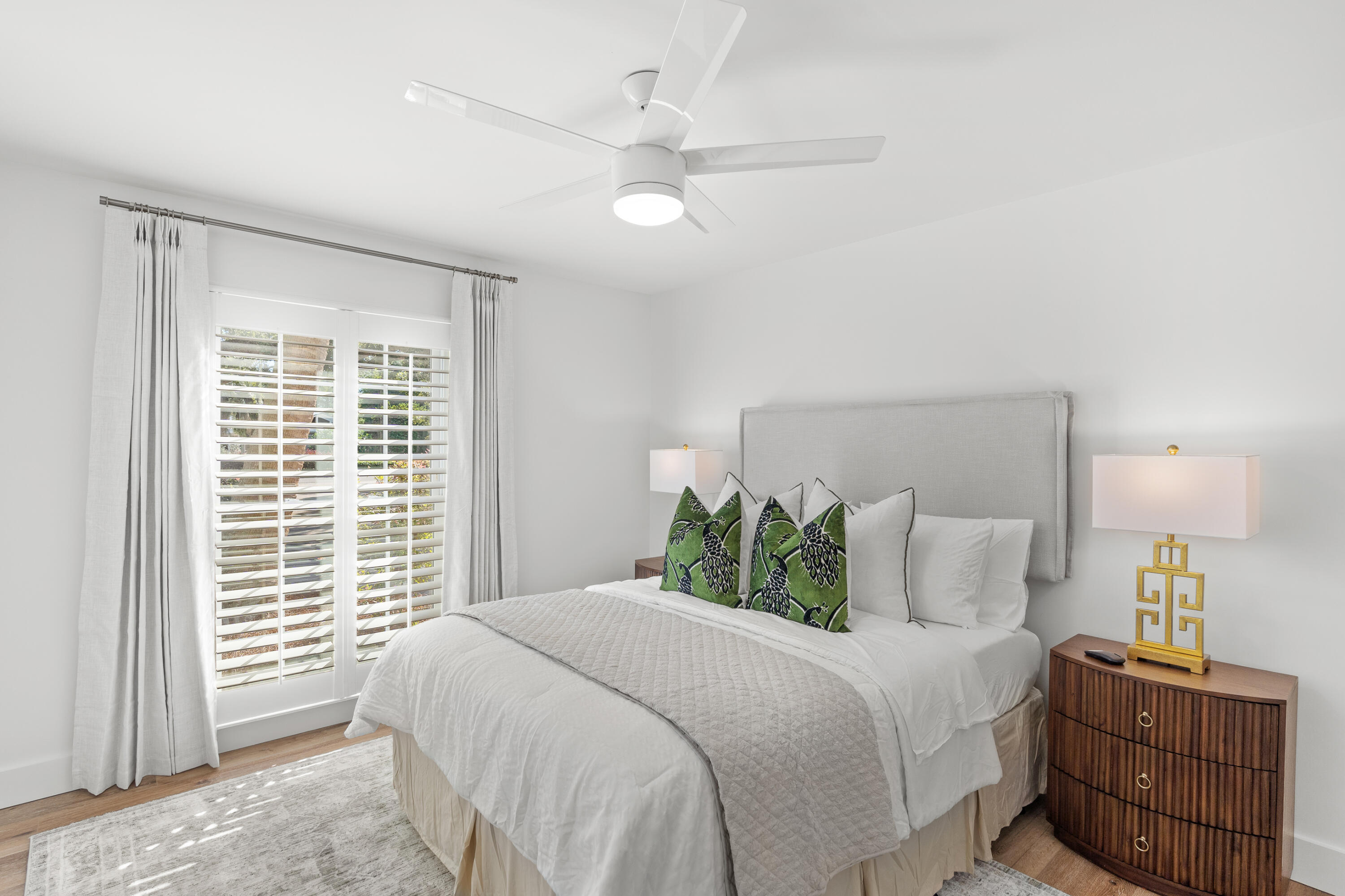 26 Sandestin Estates Drive Miramar Beach, FL 32550 - Photo 32 of 81 a bedroom with a large bed and a chandelier