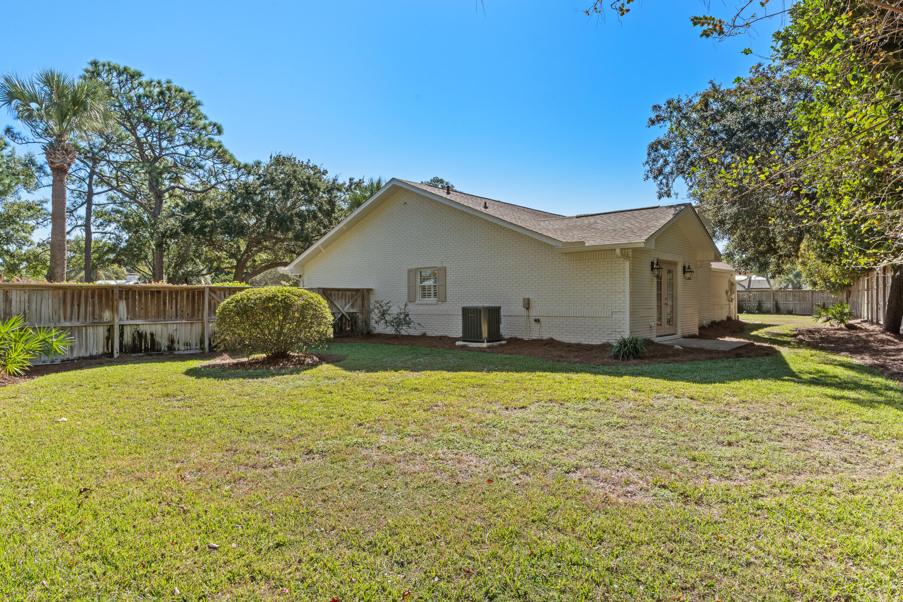26 Sandestin Estates Drive Miramar Beach, FL 32550 - Photo 60 of 81 a view of a house with a yard