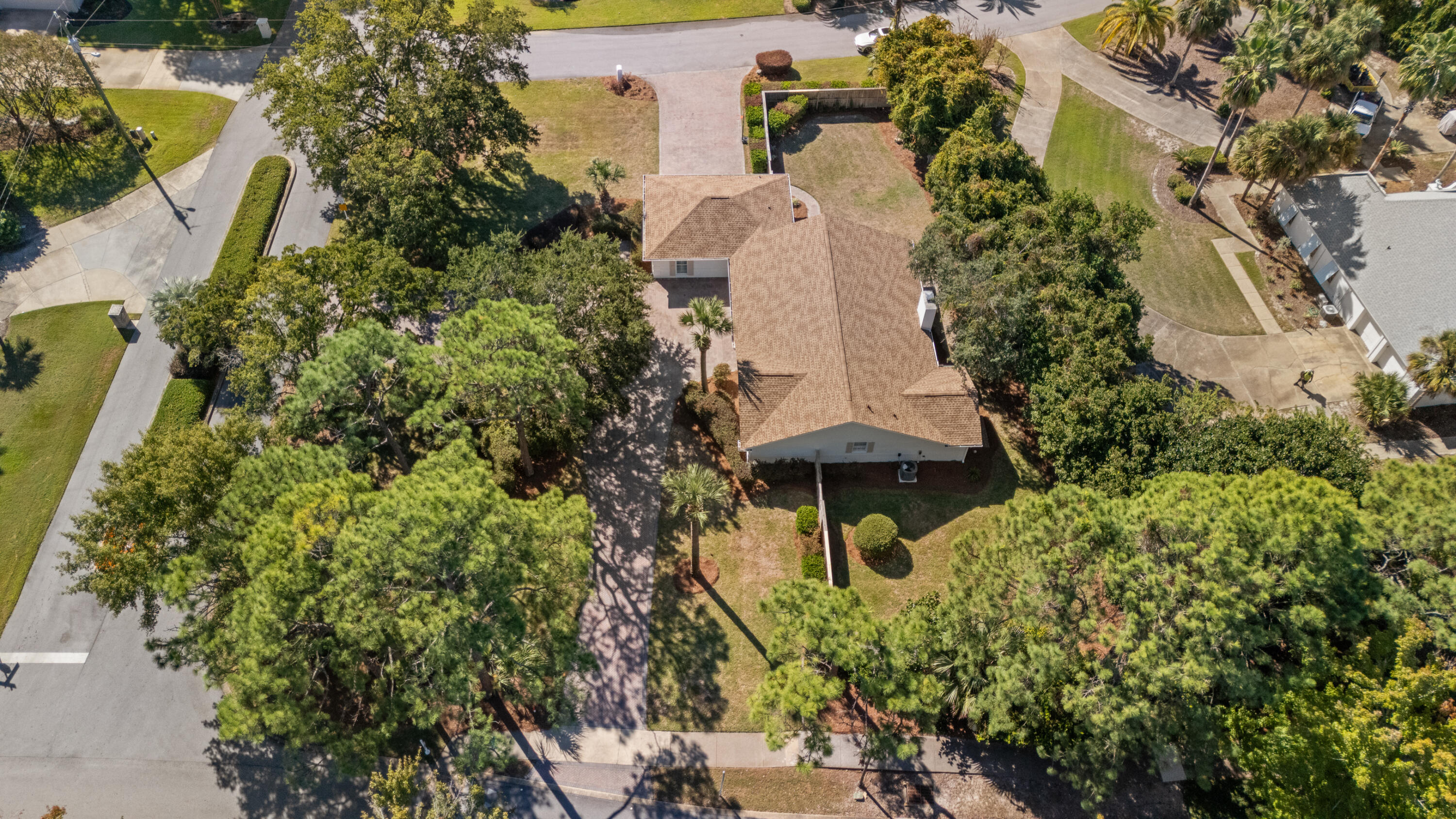 26 Sandestin Estates Drive Miramar Beach, FL 32550 - Photo 8 of 81 an aerial view of a house with a yard and garden