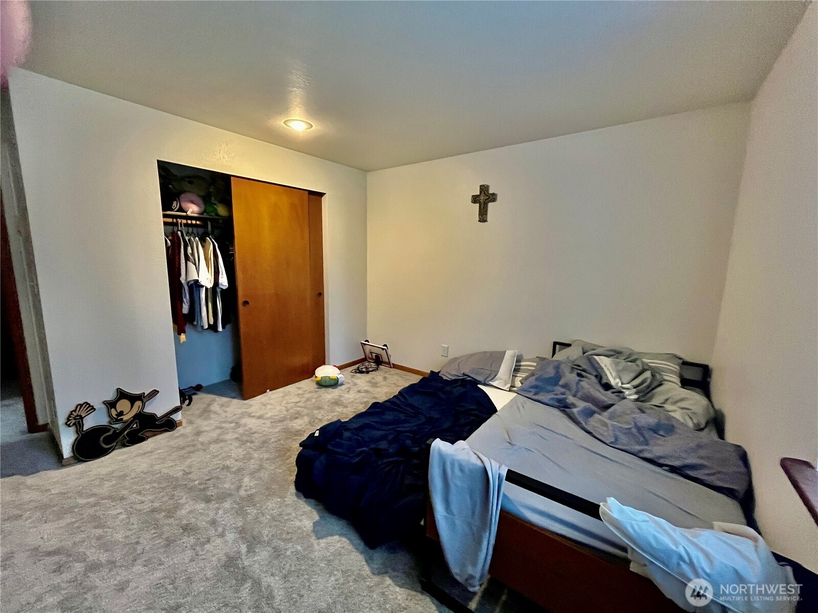 2344 Main Street Ferndale, WA 98248 - Photo 14 of 38 a bedroom with a bed and wooden floor