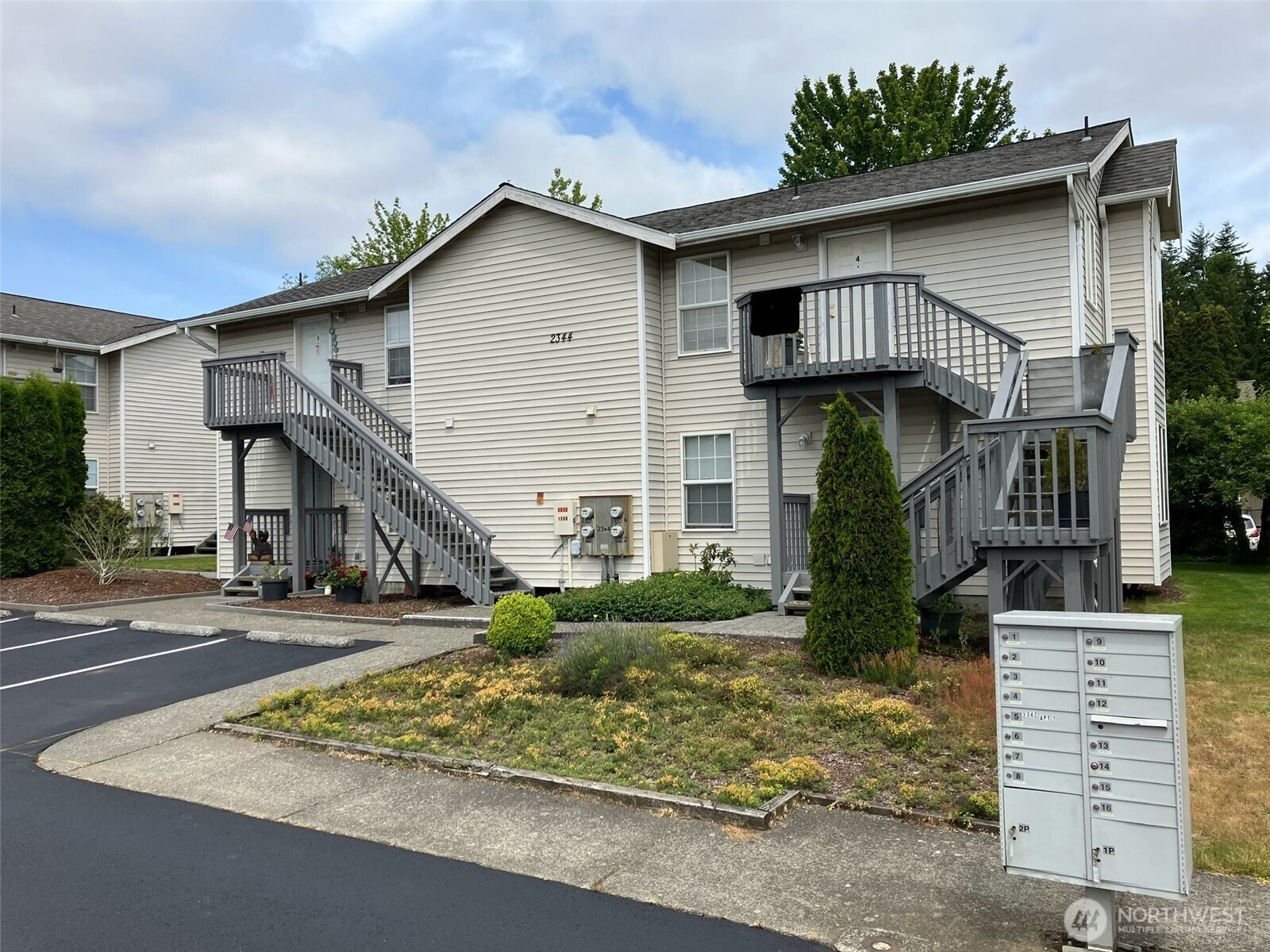 2344 Main Street Ferndale, WA 98248 - Photo 2 of 38 a front view of a house with a yard