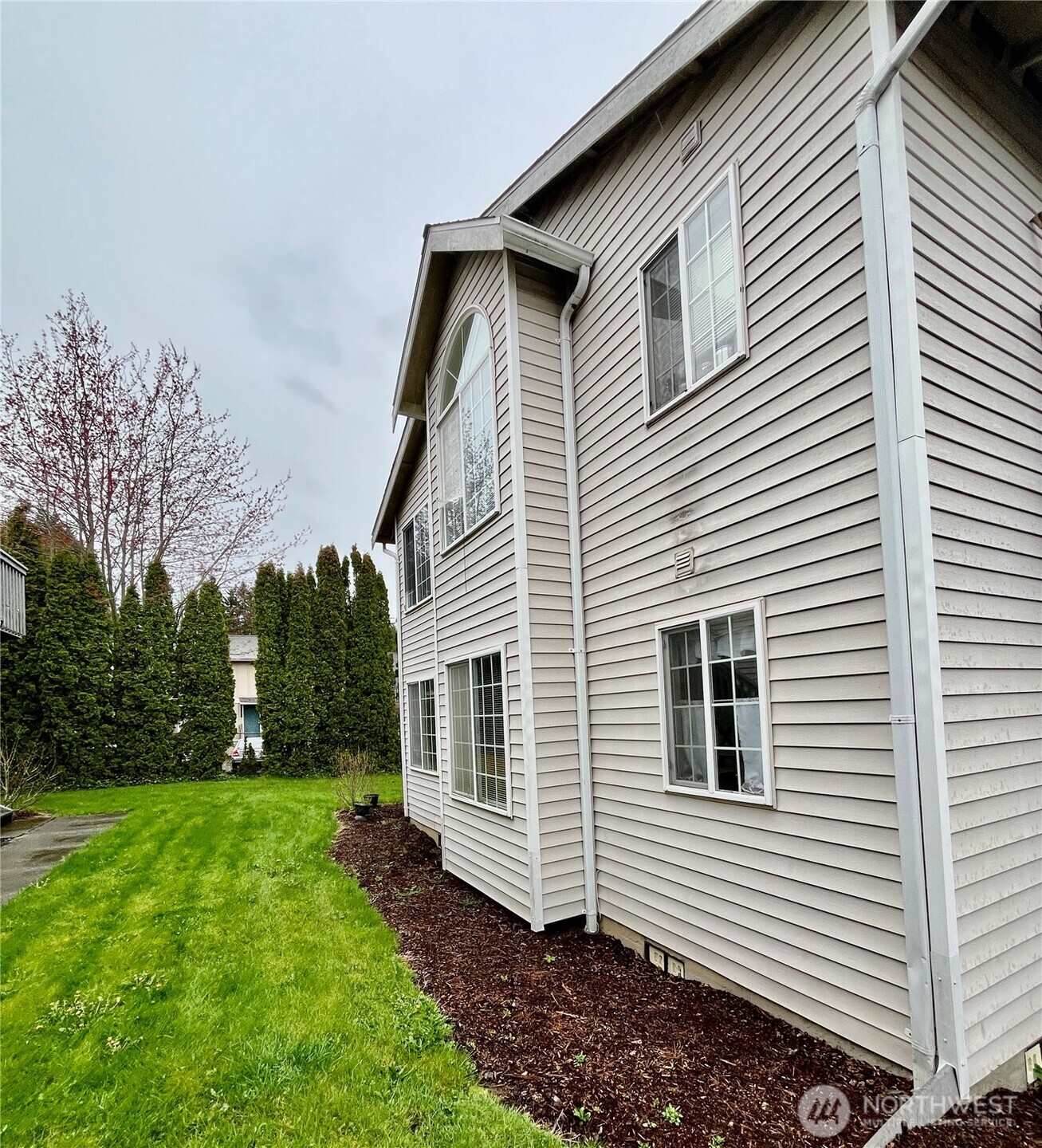2344 Main Street Ferndale, WA 98248 - Photo 32 of 38 a view of a house with yard and a tree