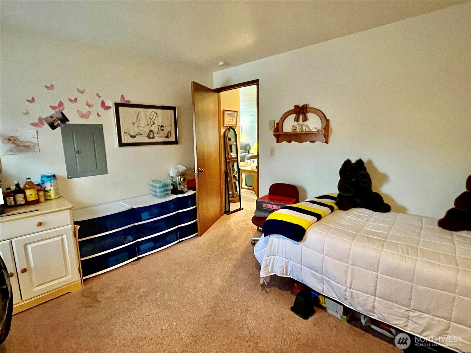2344 Main Street Ferndale, WA 98248 - Photo 6 of 38 a bedroom with a bed and a lamp on dresser