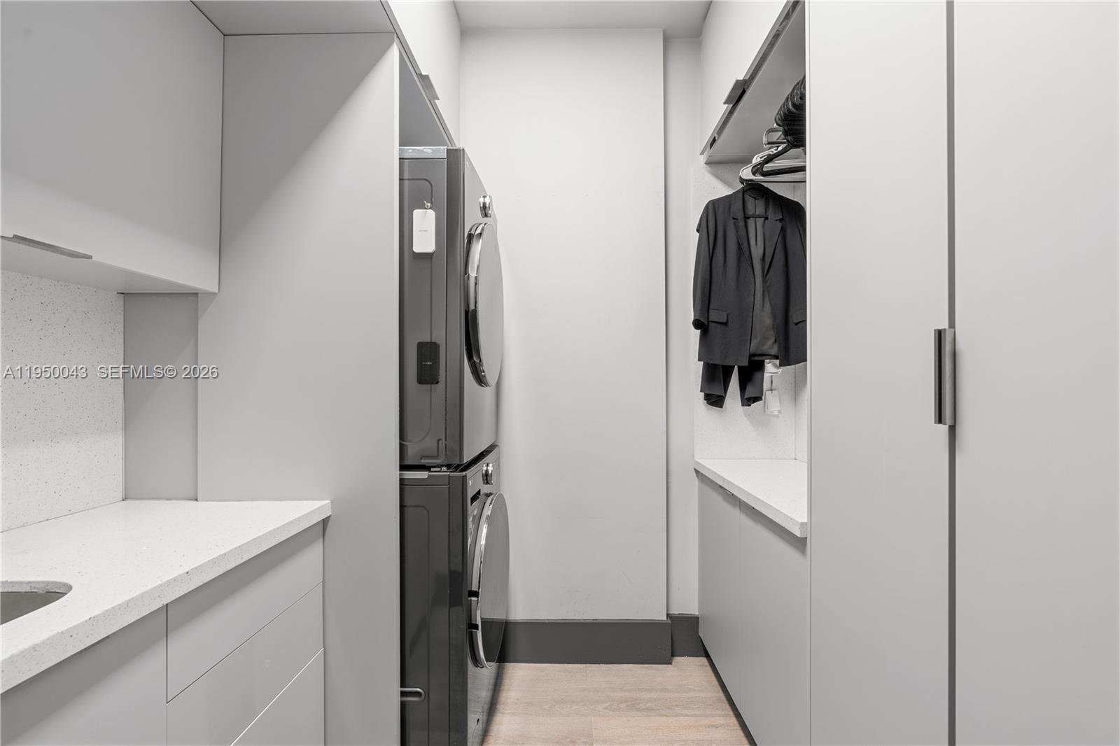 7345 Southwest 96th Street Pinecrest, FL 33156 - Photo 29 of 62 a bathroom with a sink and mirror