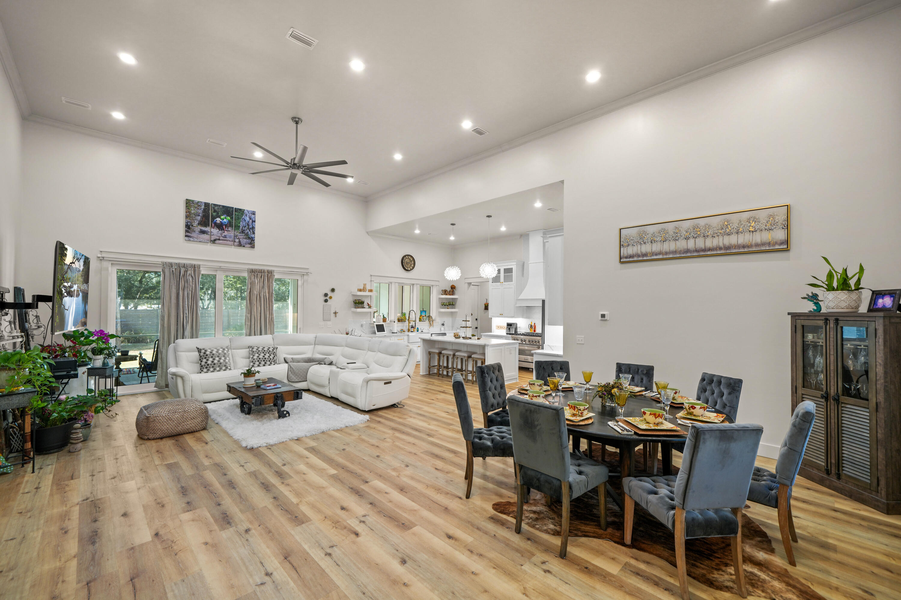 279 Smith Drive Santa Rosa Beach, FL 32459 - Photo 11 of 56 a view of a dining room with furniture window and wooden floor