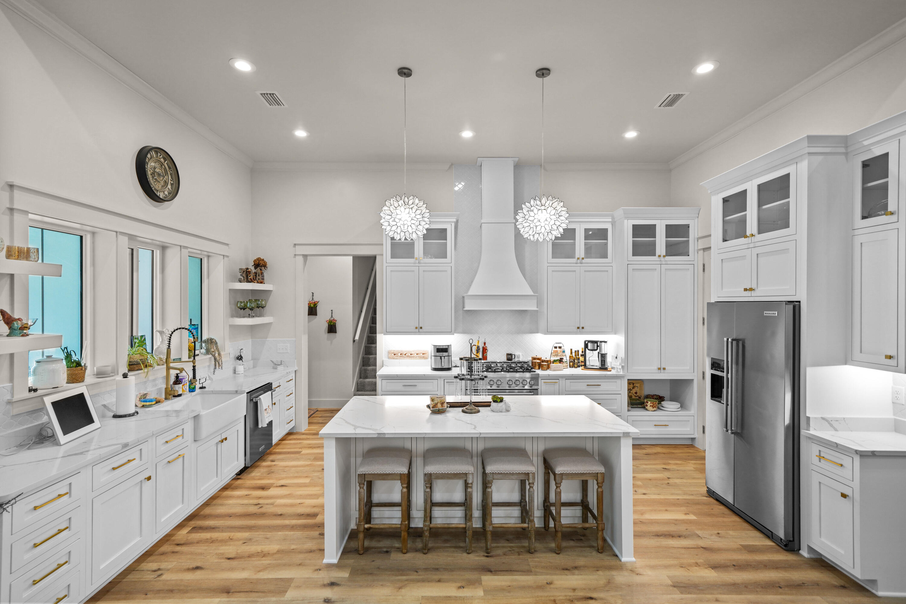 279 Smith Drive Santa Rosa Beach, FL 32459 - Photo 12 of 56 a large kitchen with a table and chairs in it