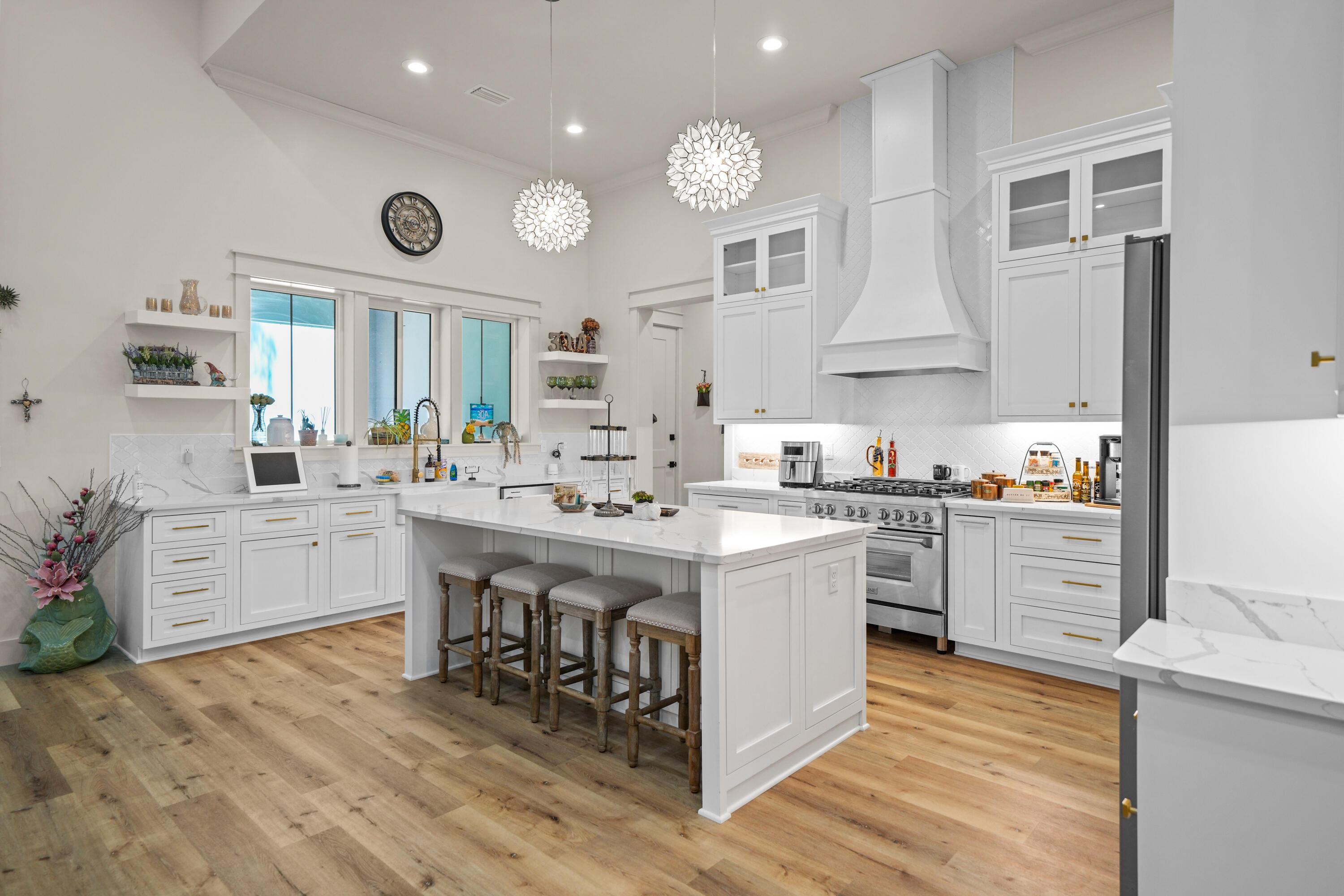 279 Smith Drive Santa Rosa Beach, FL 32459 - Photo 16 of 56 a kitchen with a sink stove and cabinets