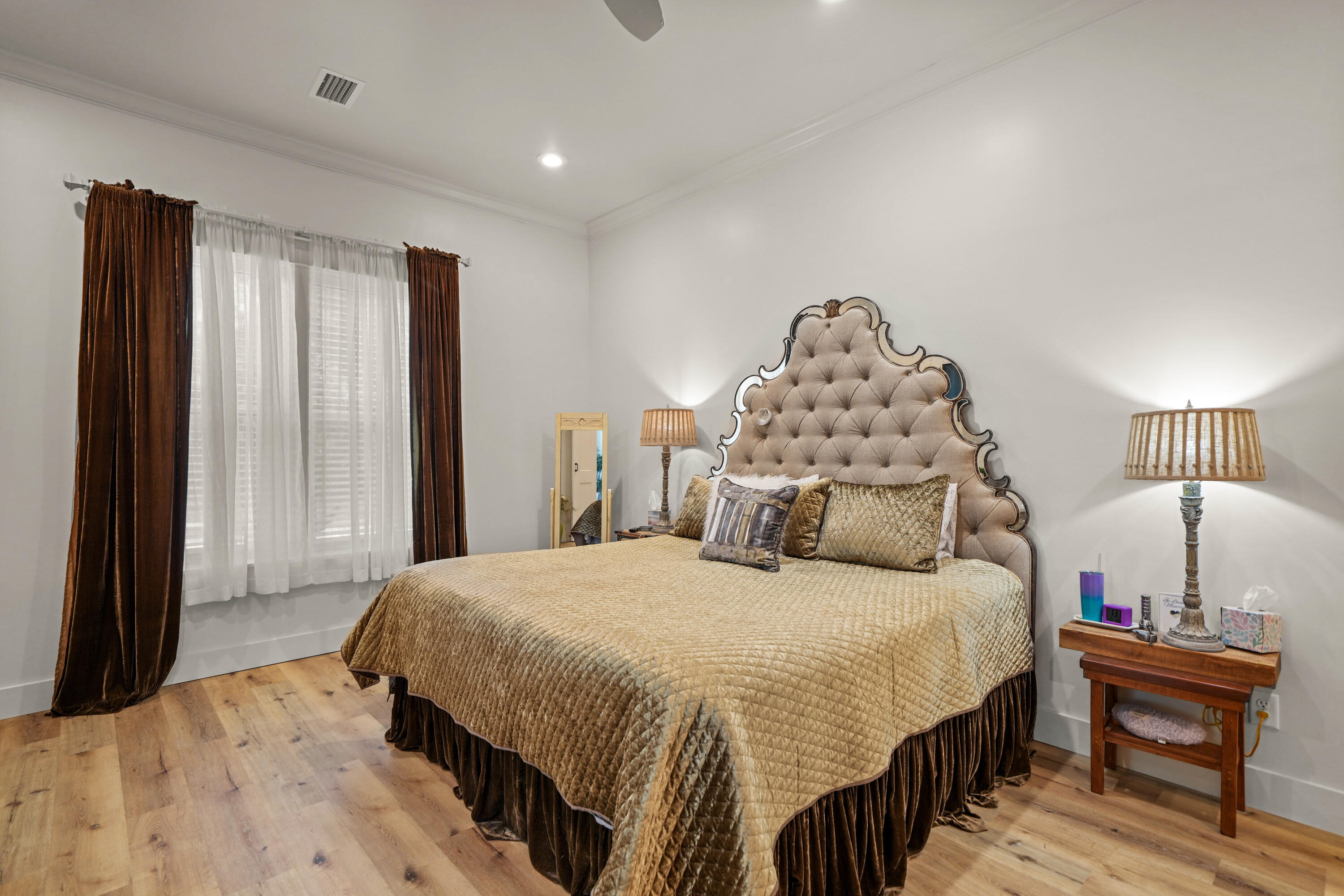 279 Smith Drive Santa Rosa Beach, FL 32459 - Photo 19 of 56 a bedroom with a bed and a lamp