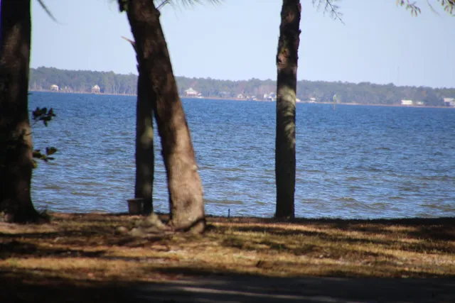 a view of a road with a building in the background
